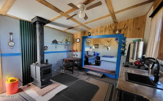 a view of gym equipment and living room with furniture