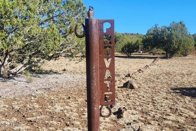 a view of a road with a building in the background