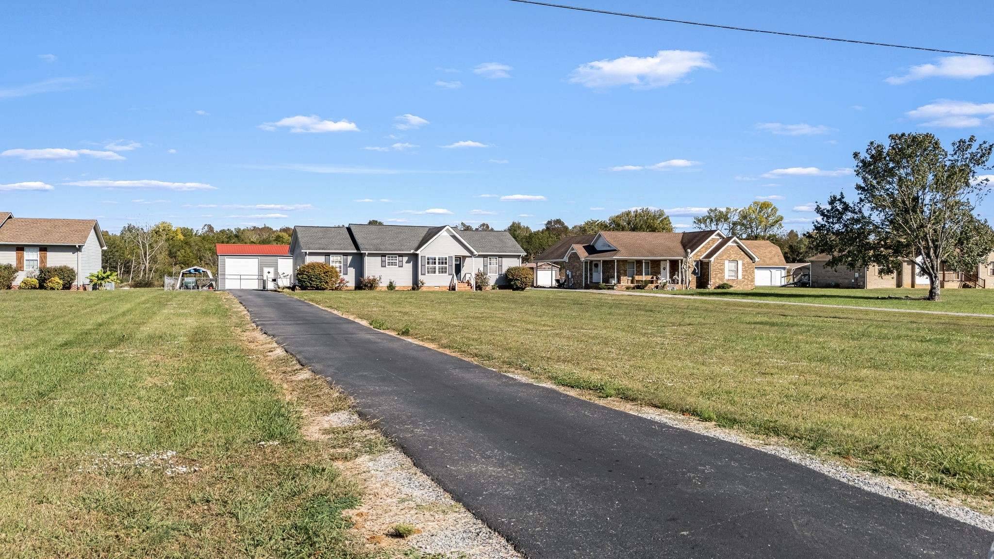 2936 Midland Road Shelbyville, TN 37160 - Photo 11 of 46 a view of a house with a yard