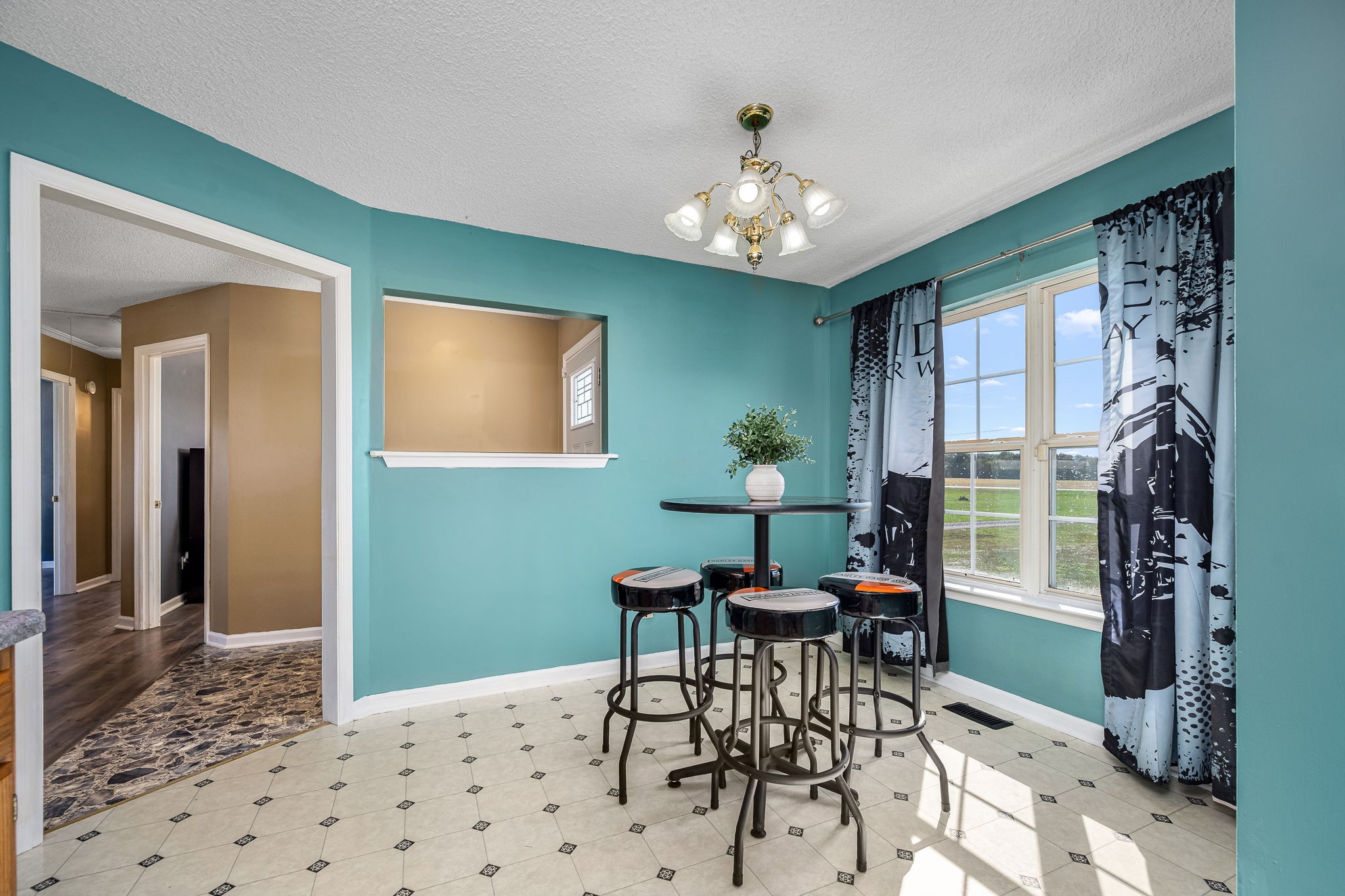 2936 Midland Road Shelbyville, TN 37160 - Photo 20 of 46 a view of a dining room with furniture and chandelier