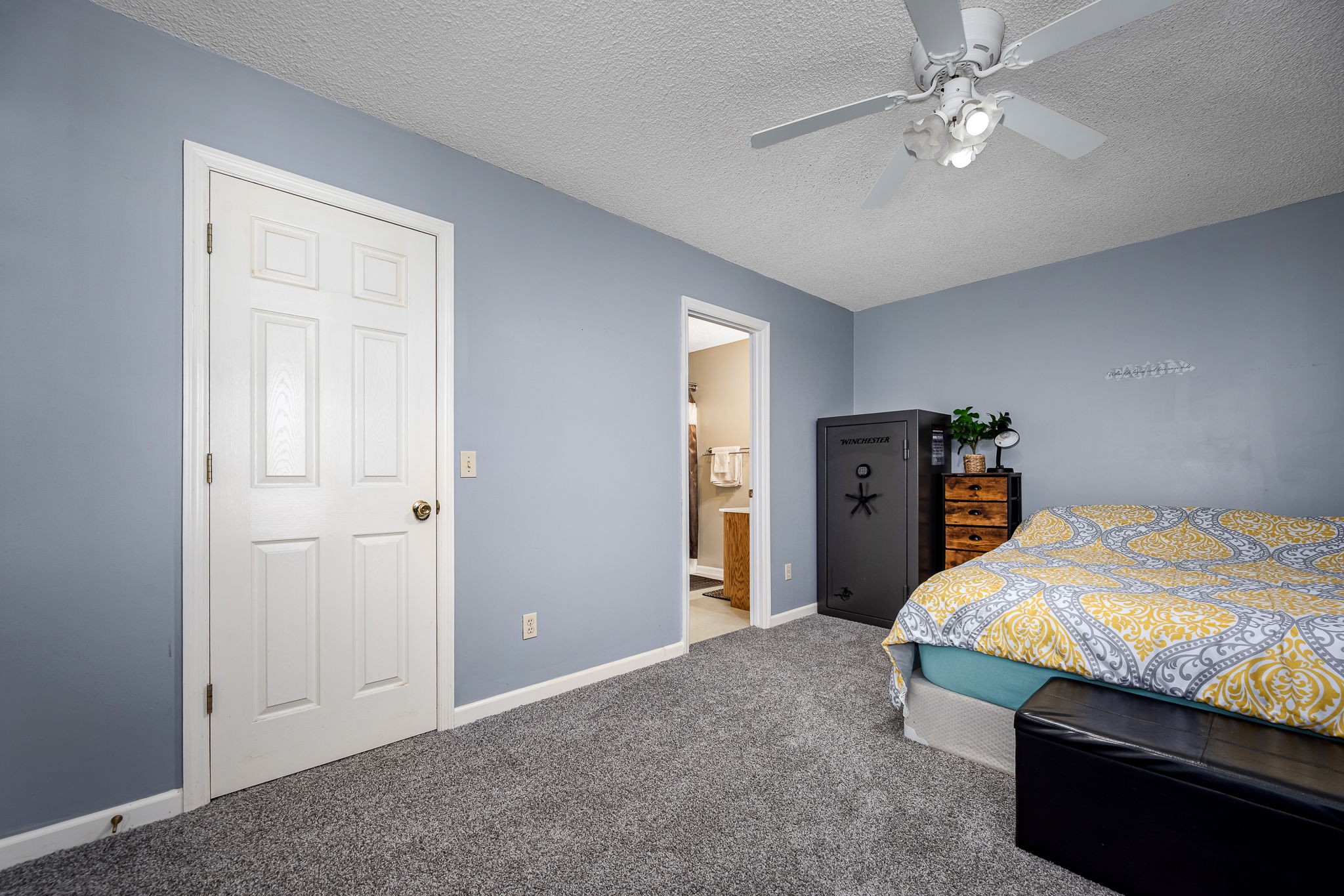2936 Midland Road Shelbyville, TN 37160 - Photo 24 of 46 a bedroom with bed and ceiling fan