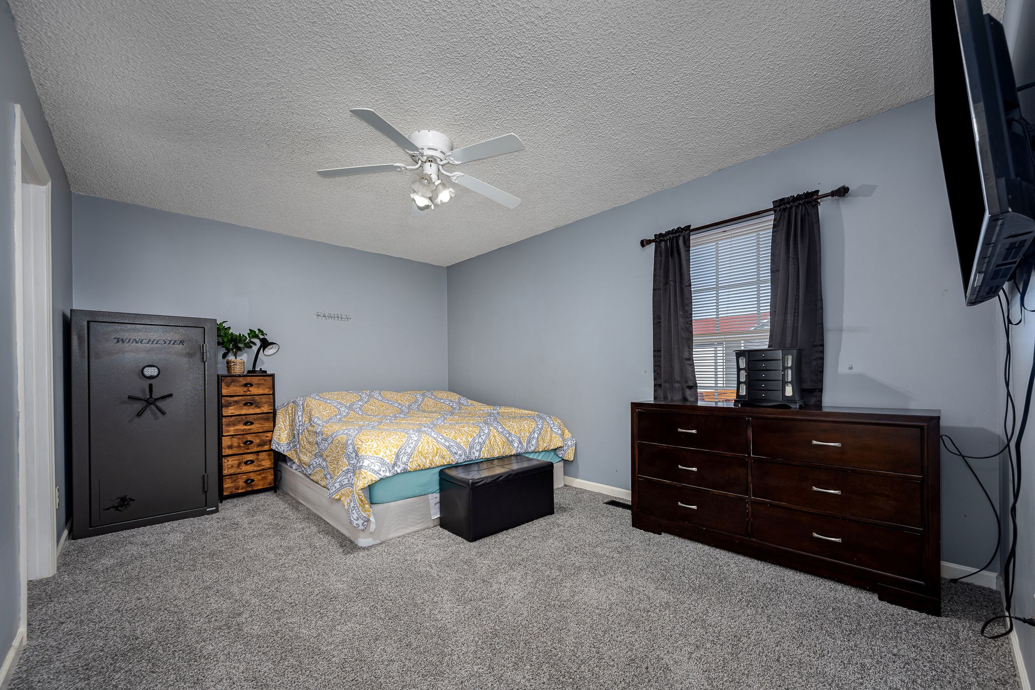 2936 Midland Road Shelbyville, TN 37160 - Photo 26 of 46 a bed room with a bed and a mirror