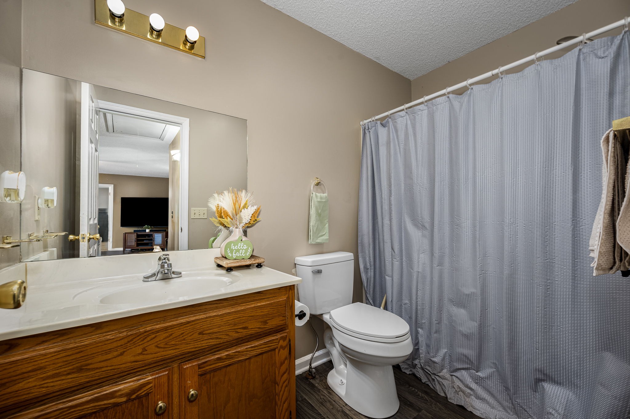 2936 Midland Road Shelbyville, TN 37160 - Photo 30 of 46 a bathroom with a sink a toilet and shower