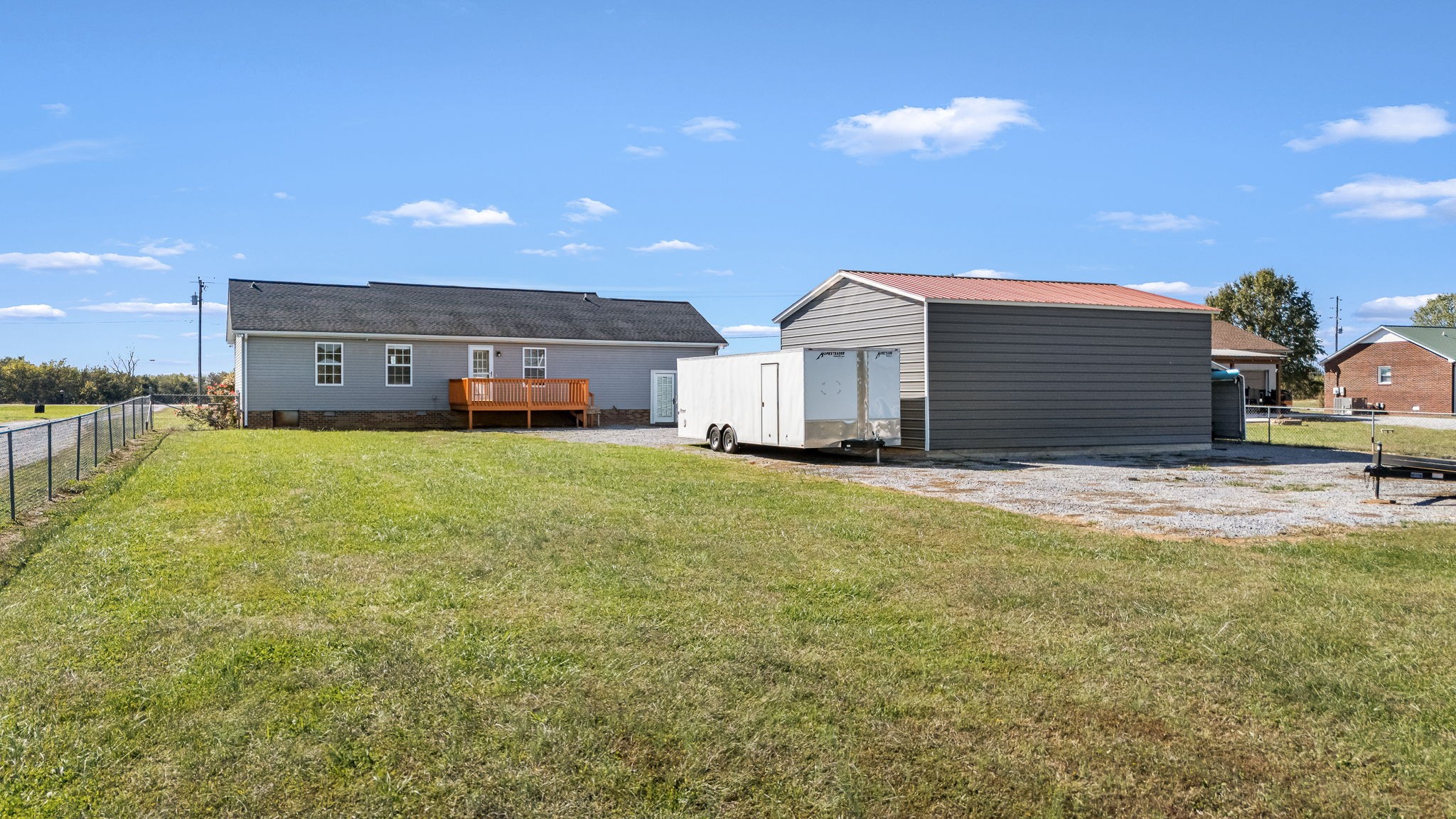 2936 Midland Road Shelbyville, TN 37160 - Photo 43 of 46 a view of a house with a big yard and large tree