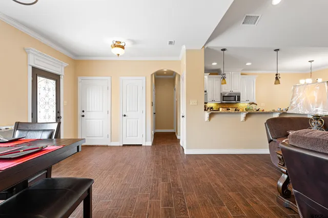 a view of a kitchen and dining room