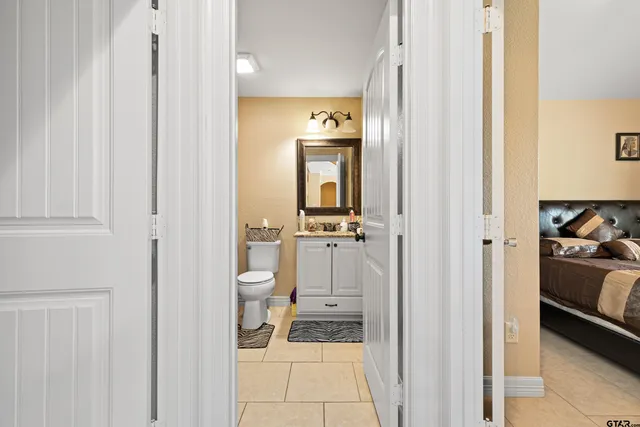 a view of a bedroom from a hallway