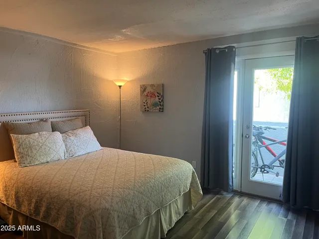 a bathroom with a shower and a toilet