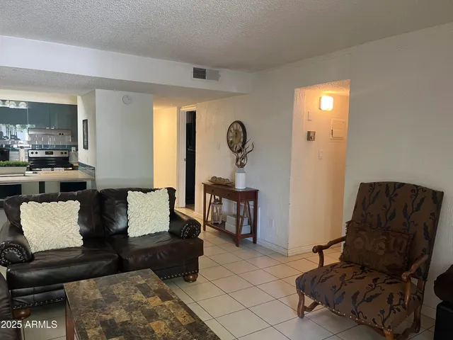 a living room with furniture and a couch