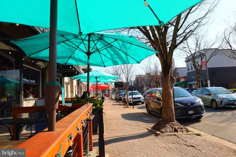 a view of yard with patio