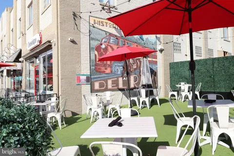 an aerial view of a house with swimming pool