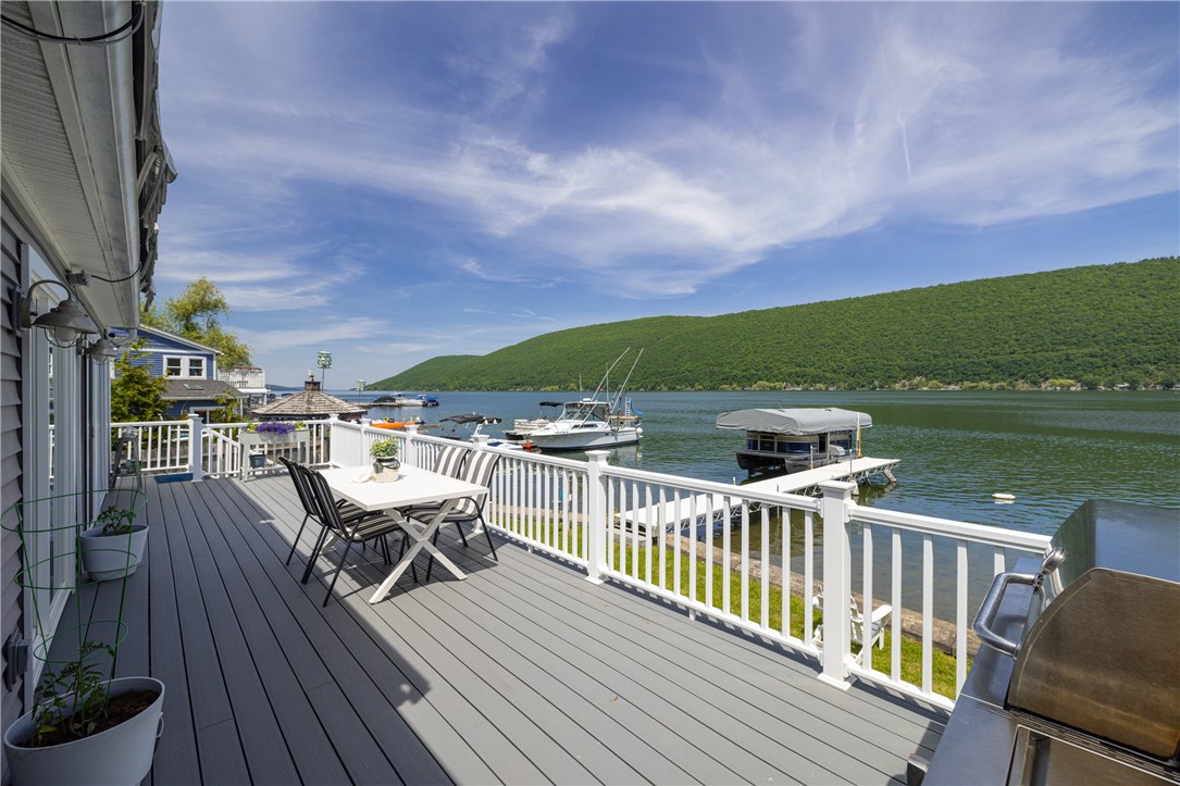 7113 State Rte 21 South Bristol, NY 14512 - Photo 6 of 47 Expansive wrap-around deck, perfect for family and
