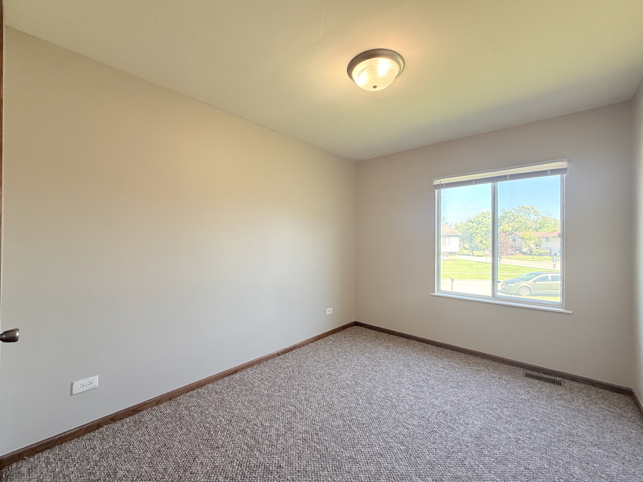 18018 Chantilly Lane Hazel Crest, IL 60429 - Photo 11 of 20 an empty room with a window