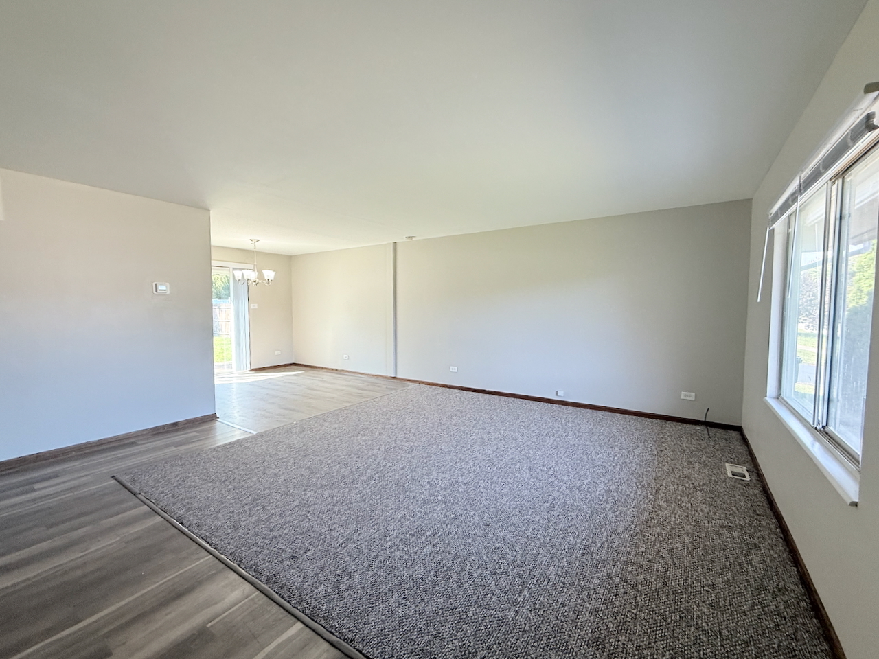 18018 Chantilly Lane Hazel Crest, IL 60429 - Photo 3 of 20 an empty room with windows