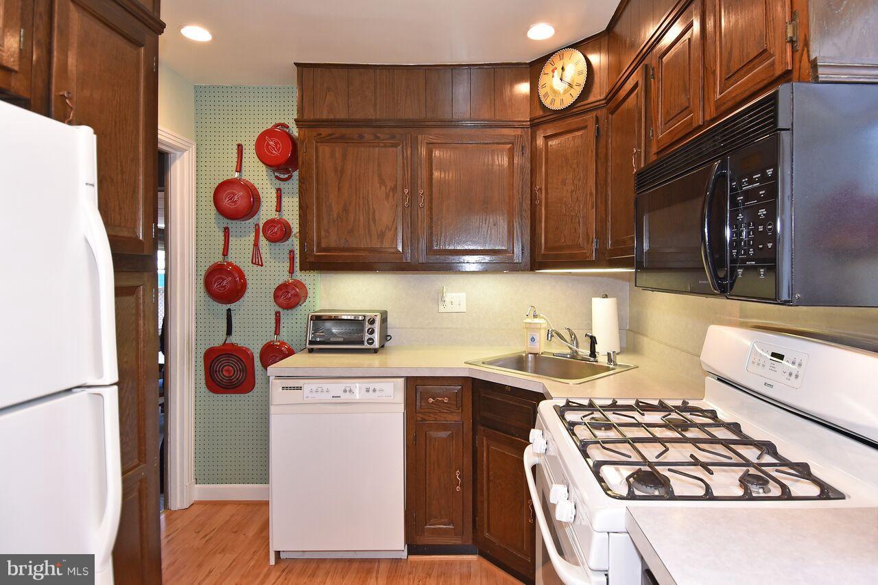 10111 Greenock Road Silver Spring, MD 20901 - Photo 13 of 30 BOARD ON WALL TO HANG POTS AND PANS