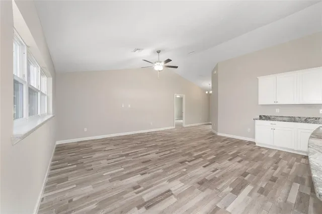 a view of a kitchen with marble kitchen and a sink