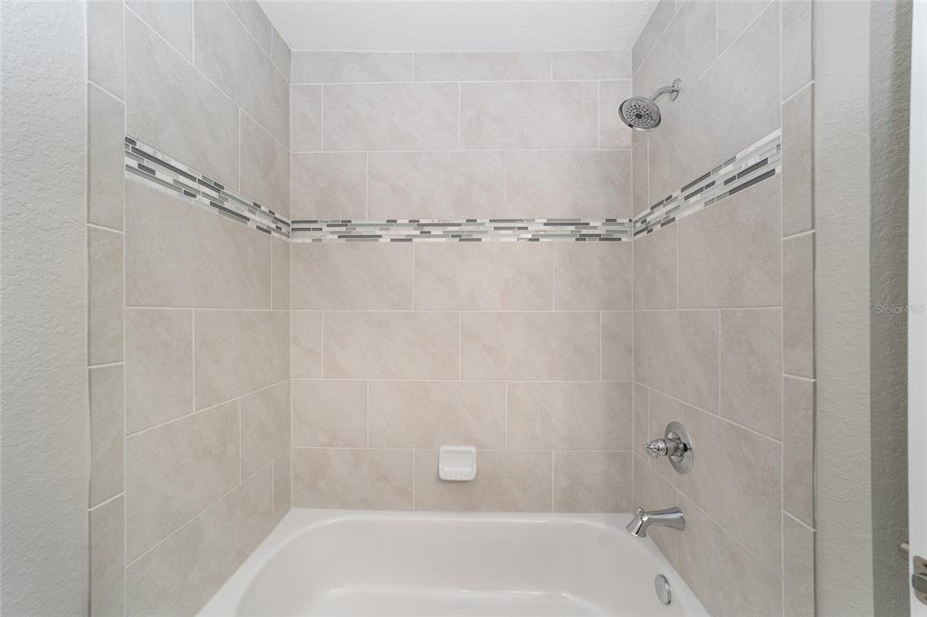 11339 Southwest 65th Ave Road Ocala, FL 34476 - Photo 37 of 42 a close view of a bathtub in bathroom