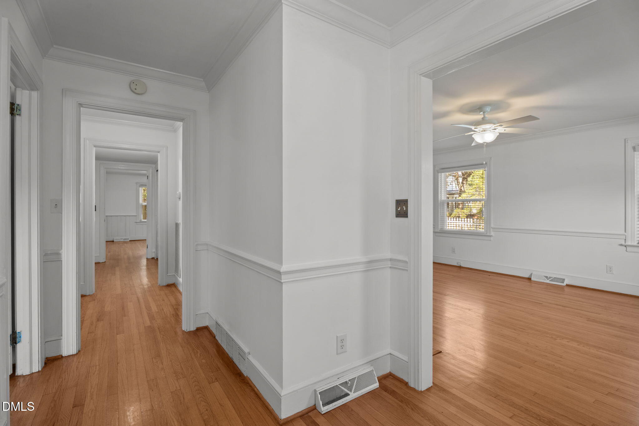 215 East Branch Street Spring Hope, NC 27882 - Photo 12 of 61 wooden floor in an empty room with a window
