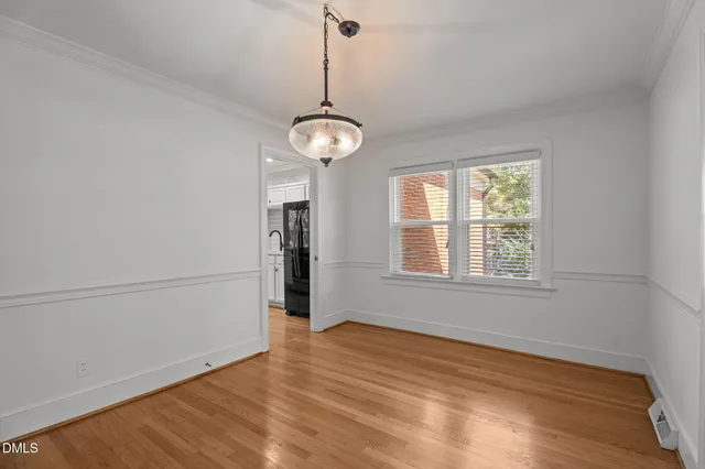 a bathroom with a granite countertop sink a shower and a mirror