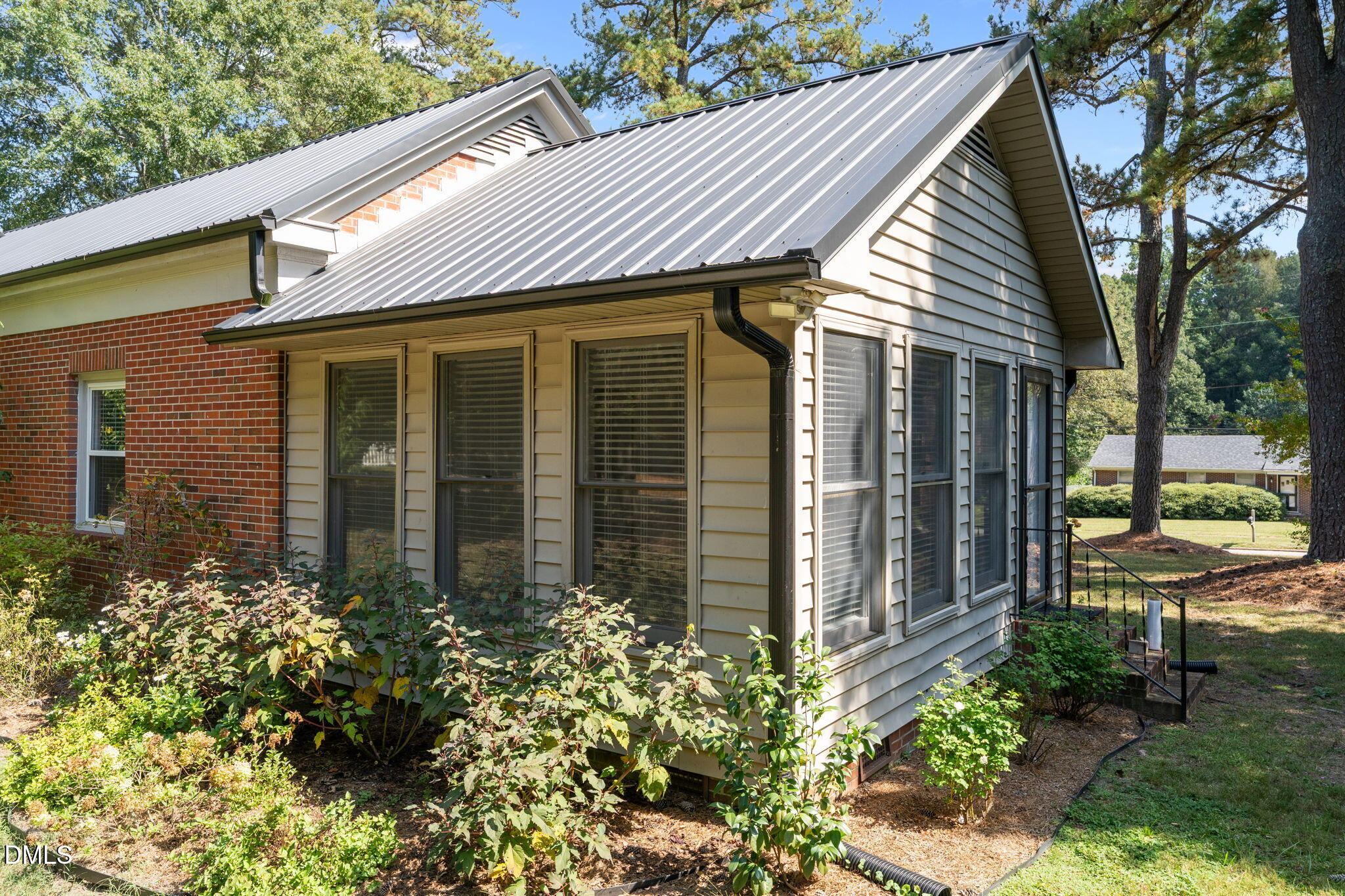215 East Branch Street Spring Hope, NC 27882 - Photo 42 of 61 a front view of a house with garden