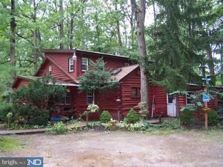 7 Pine Road Mount Laurel, NJ 08054 - Photo 1 of 6 a front view of a house with garden