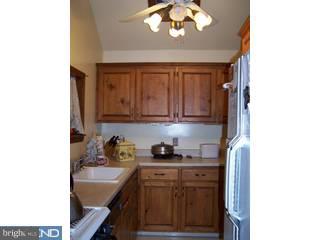 7 Pine Road Mount Laurel, NJ 08054 - Photo 6 of 6 a kitchen with a sink and cabinets