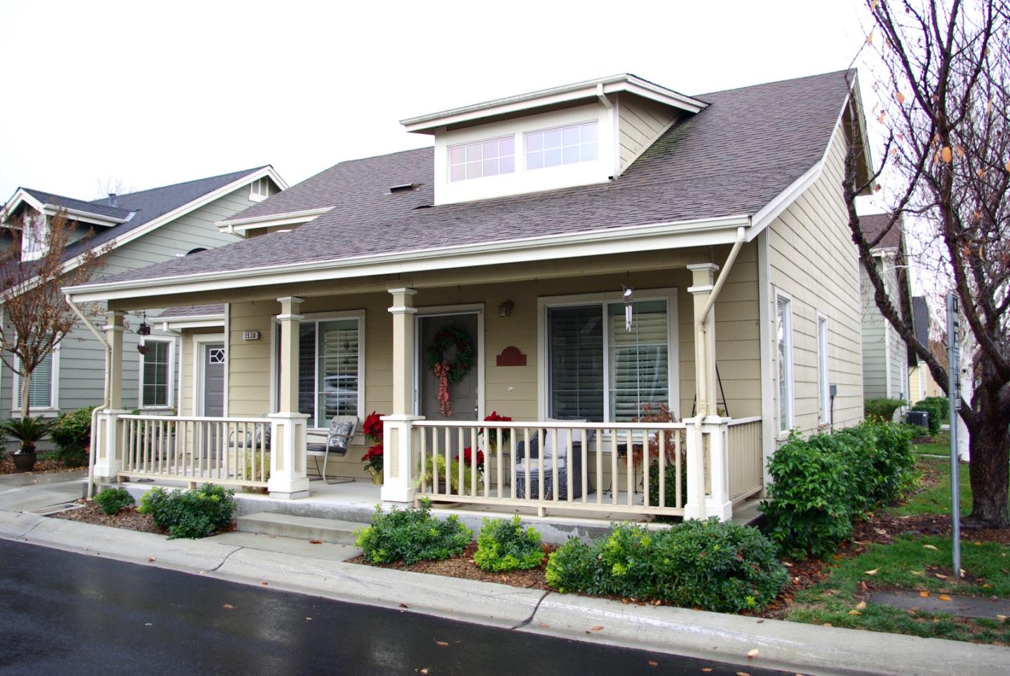front view of a house with a small yard
