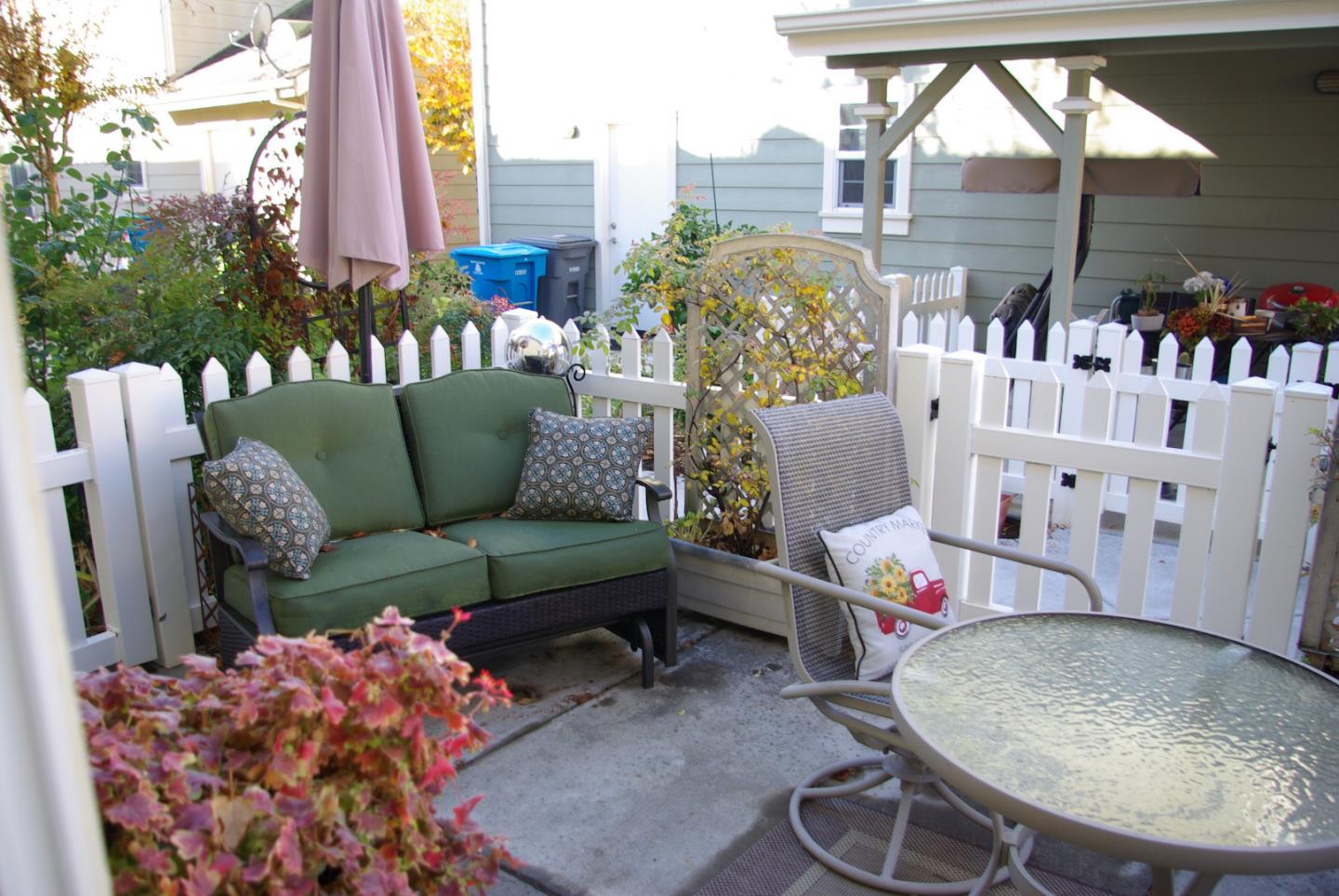 1530 Rosette Way Gilroy, CA 95020 - Photo 9 of 12 a living room with furniture and a floor to ceiling window