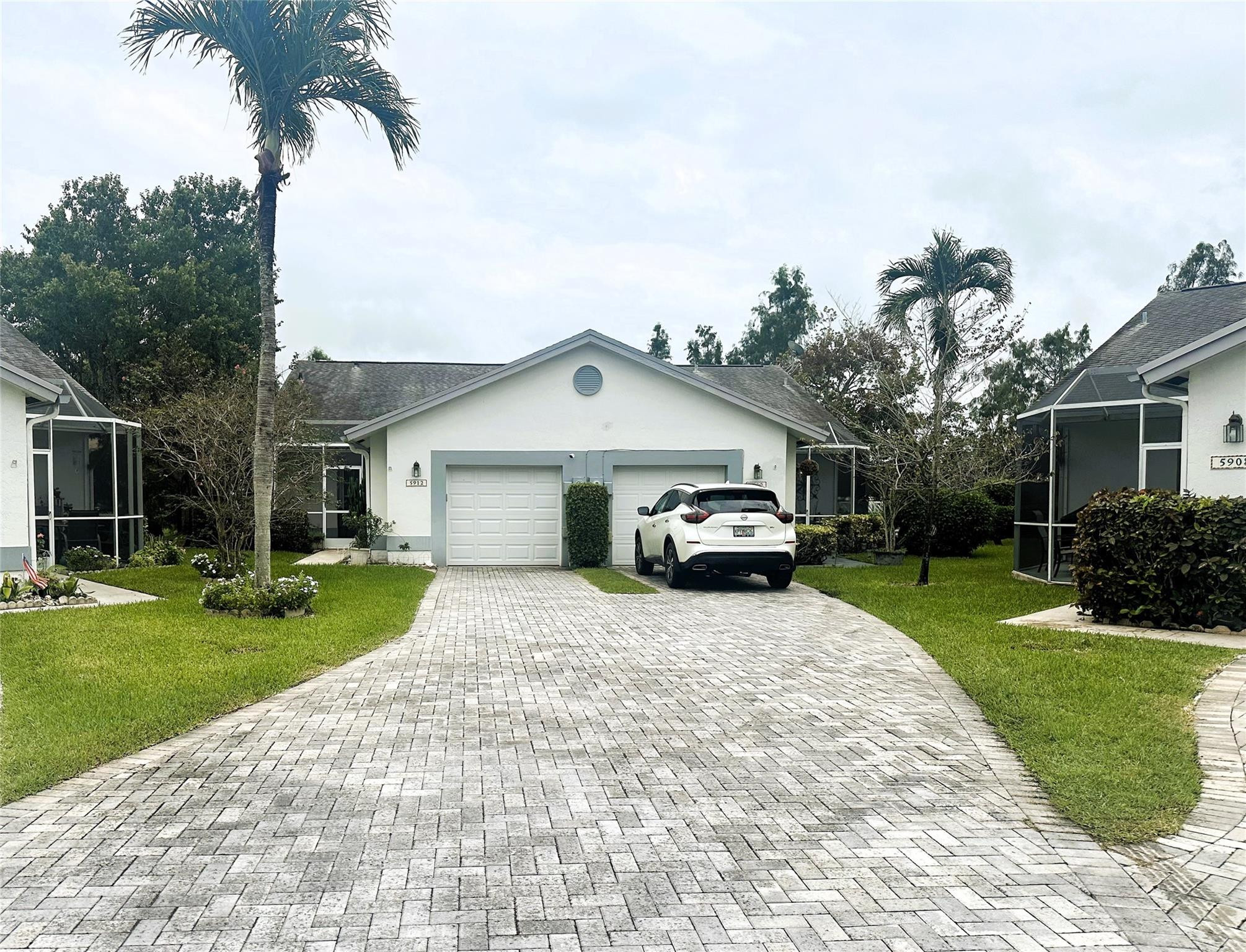 5912 Northwest 93rd Terrace Tamarac, FL 33321 - Photo 1 of 47 Very long driveway