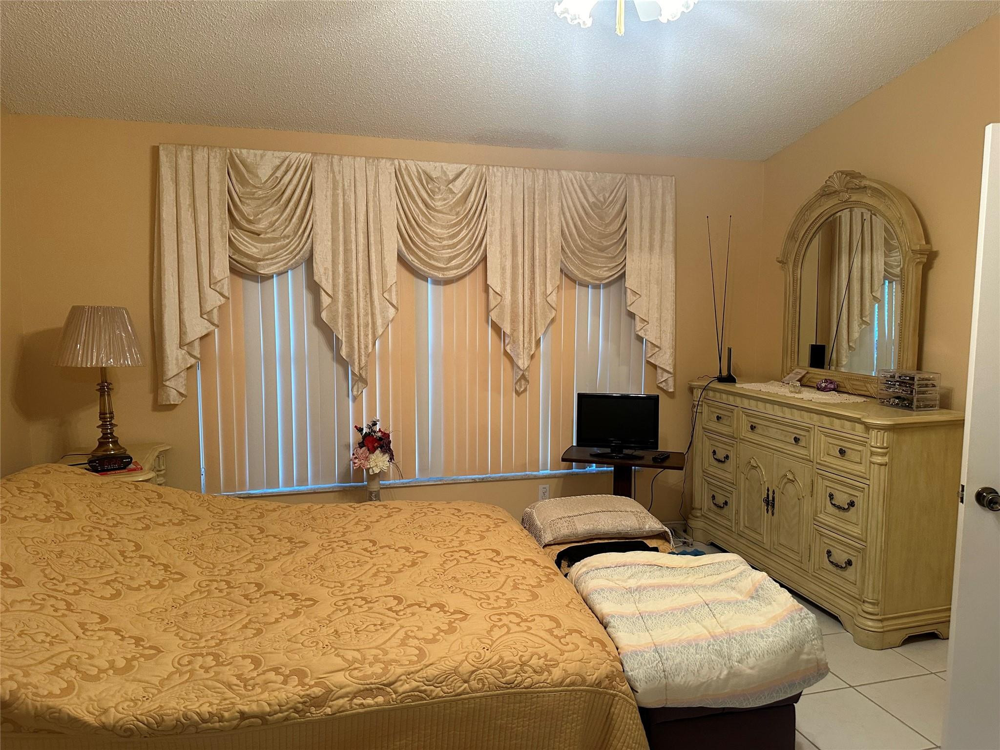 5912 Northwest 93rd Terrace Tamarac, FL 33321 - Photo 13 of 47 Masterbedroom