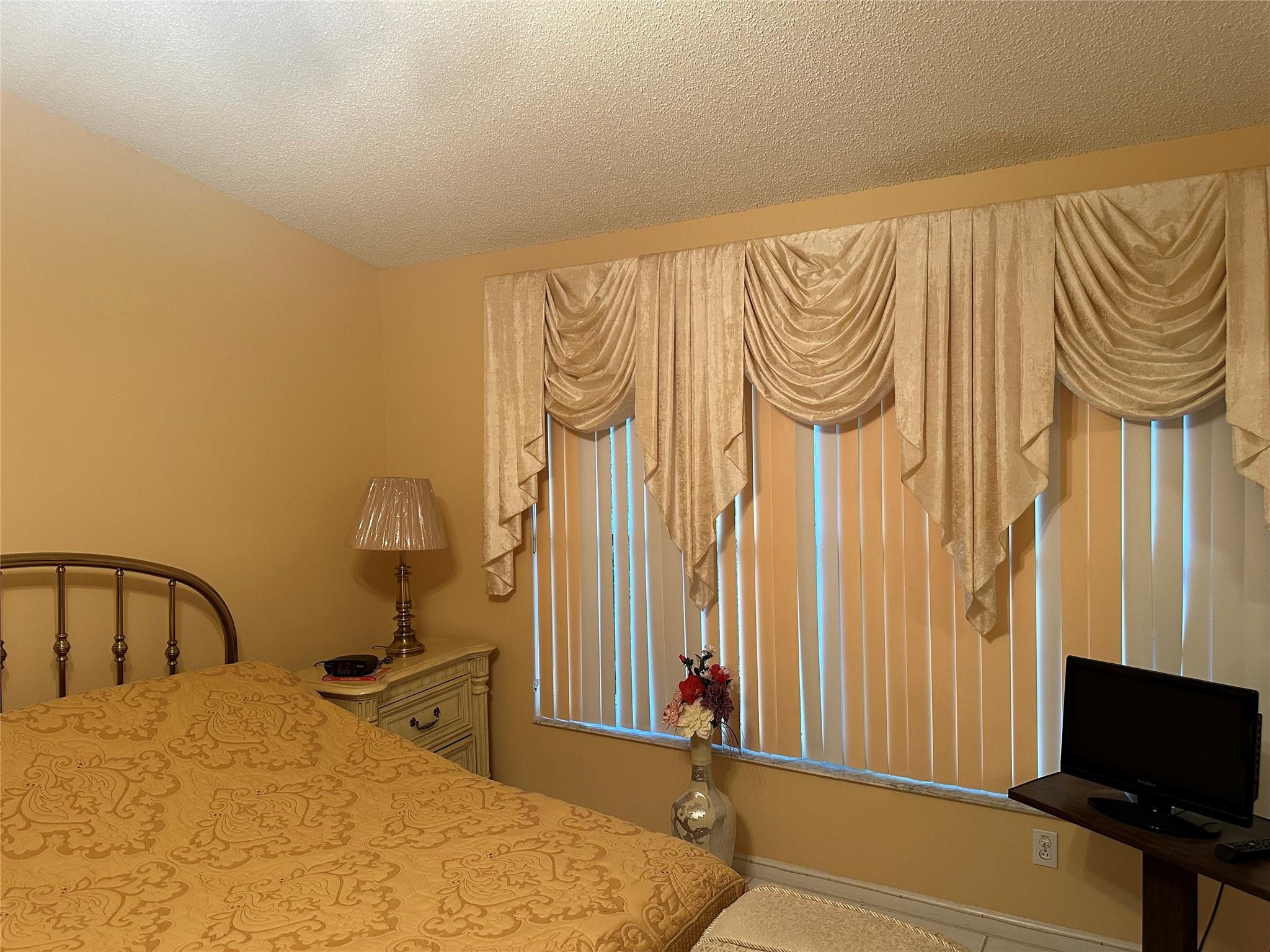 5912 Northwest 93rd Terrace Tamarac, FL 33321 - Photo 22 of 47 Master bedroom