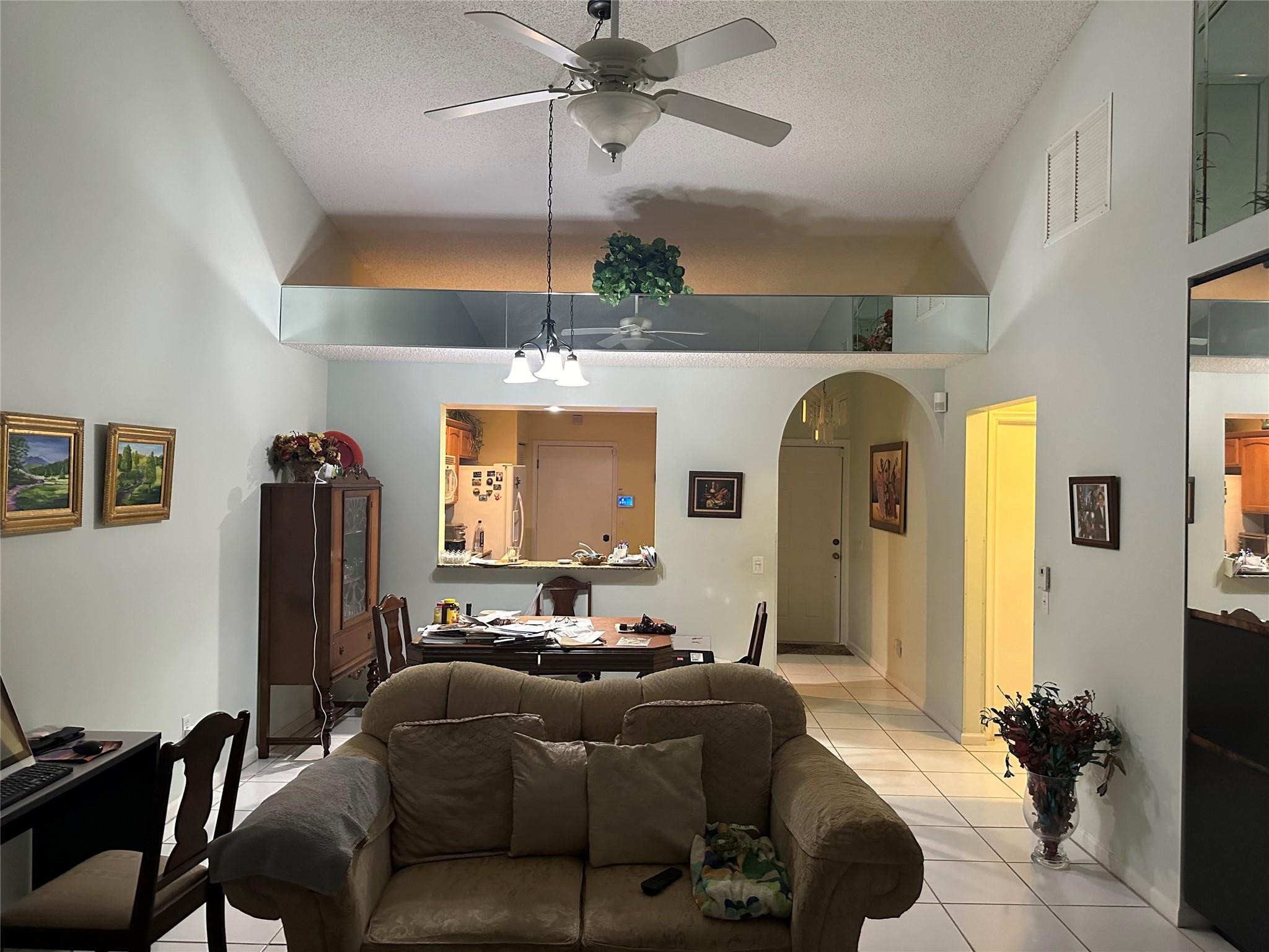 5912 Northwest 93rd Terrace Tamarac, FL 33321 - Photo 26 of 47 Living room looking into kitchen