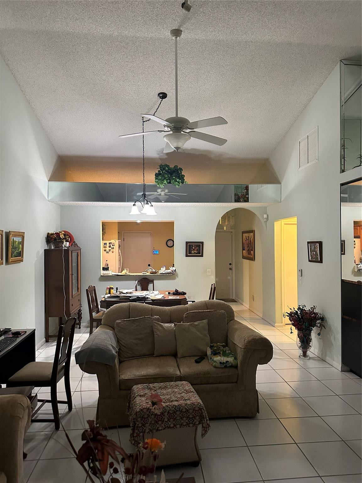 5912 Northwest 93rd Terrace Tamarac, FL 33321 - Photo 28 of 47 Living room looking into kitchen
