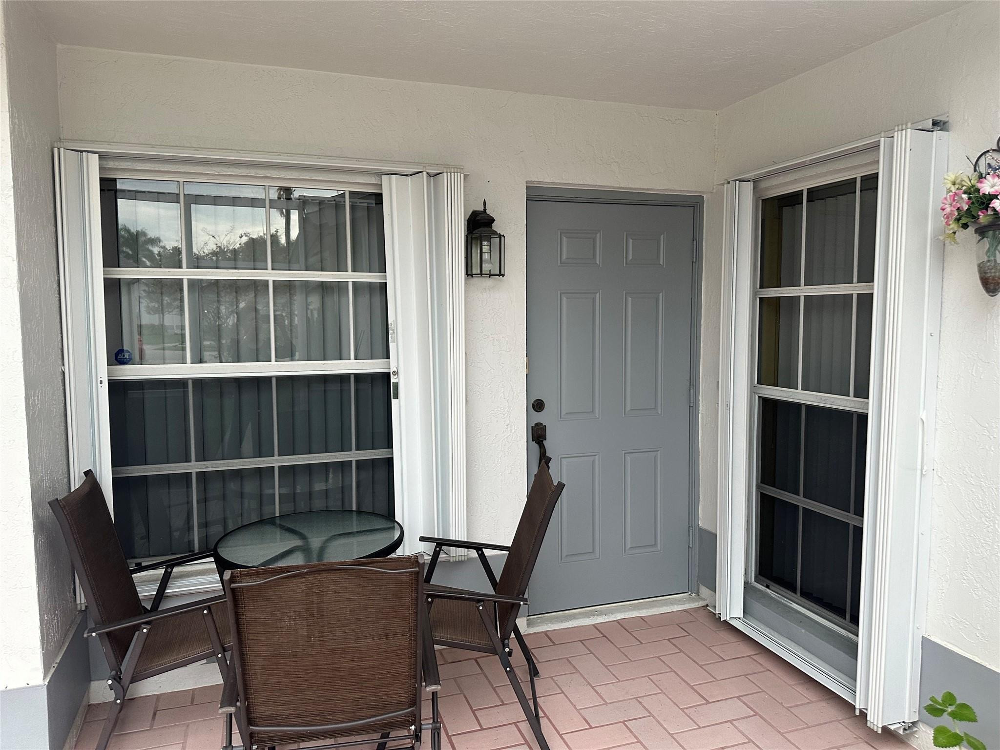 5912 Northwest 93rd Terrace Tamarac, FL 33321 - Photo 3 of 47 Front patio