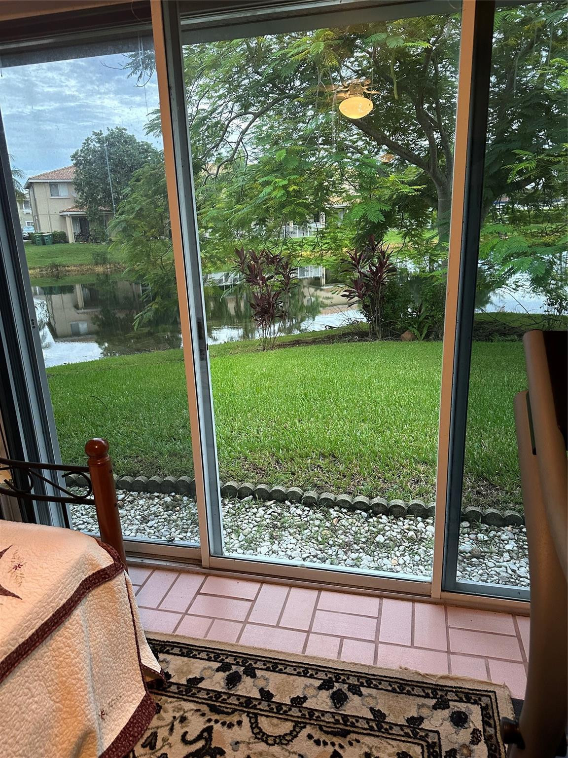 5912 Northwest 93rd Terrace Tamarac, FL 33321 - Photo 31 of 47 Looking out from back patio