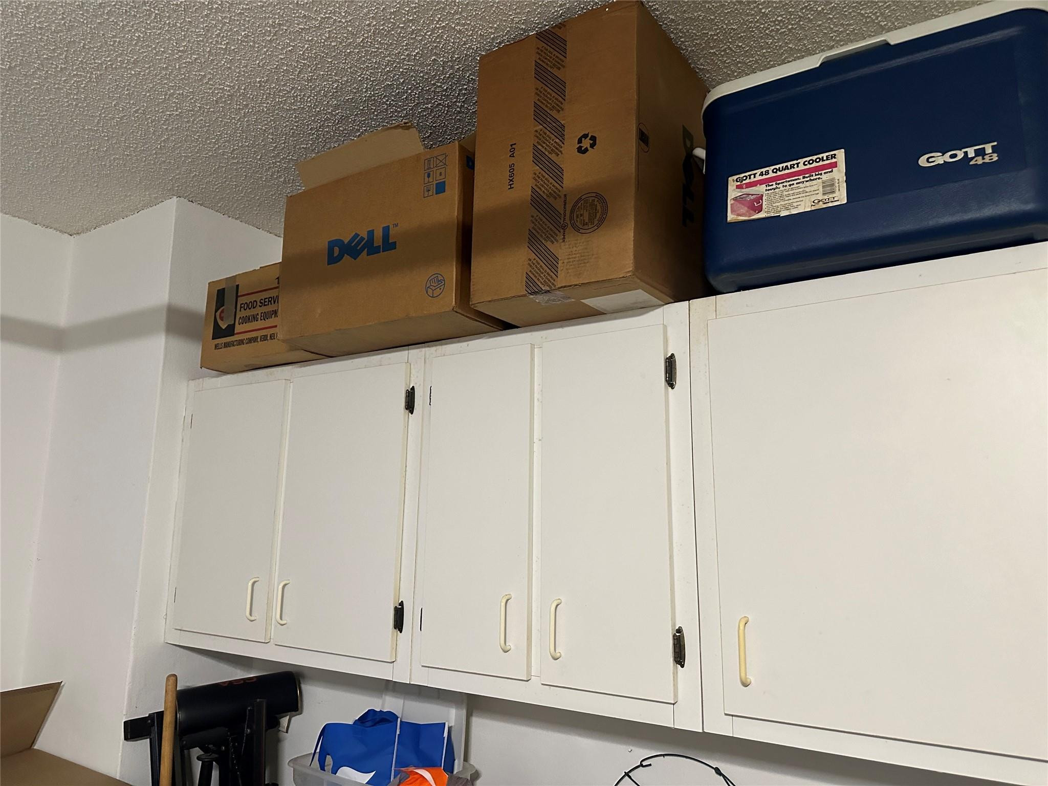 5912 Northwest 93rd Terrace Tamarac, FL 33321 - Photo 40 of 47 Storage cabinets in garage