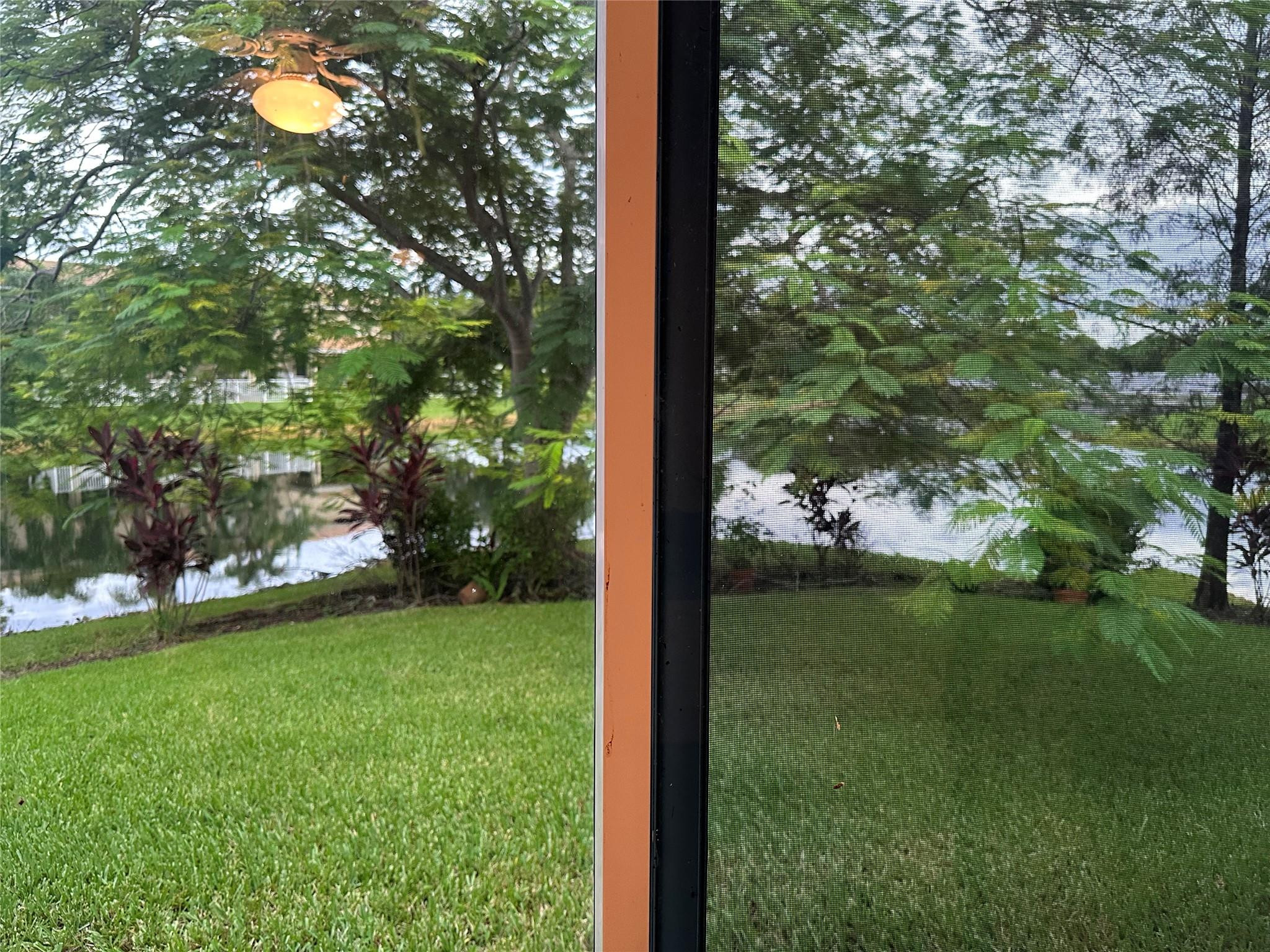 5912 Northwest 93rd Terrace Tamarac, FL 33321 - Photo 4 of 47 Looking out from back patio
