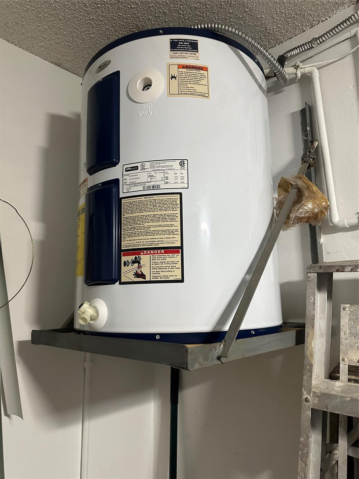 5912 Northwest 93rd Terrace Tamarac, FL 33321 - Photo 42 of 47 Elevated water heater