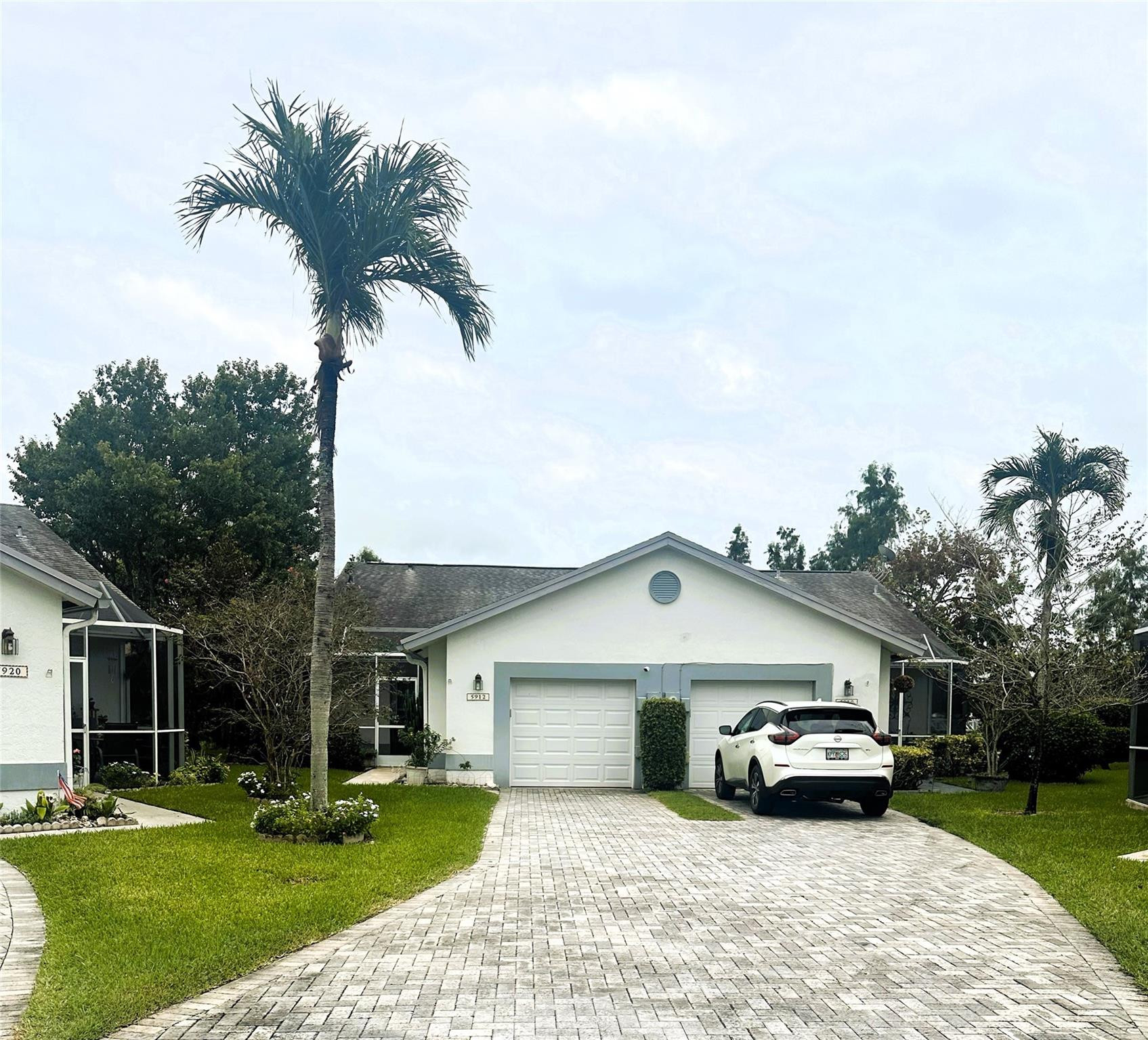 5912 Northwest 93rd Terrace Tamarac, FL 33321 - Photo 47 of 47 Front with very long driveway