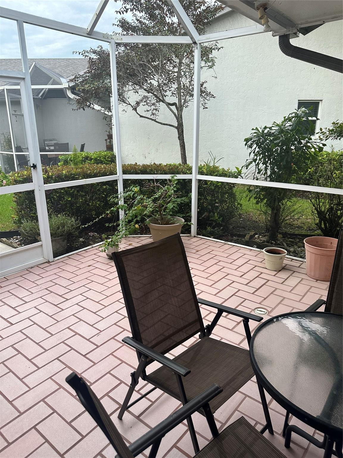 5912 Northwest 93rd Terrace Tamarac, FL 33321 - Photo 7 of 47 Front patio