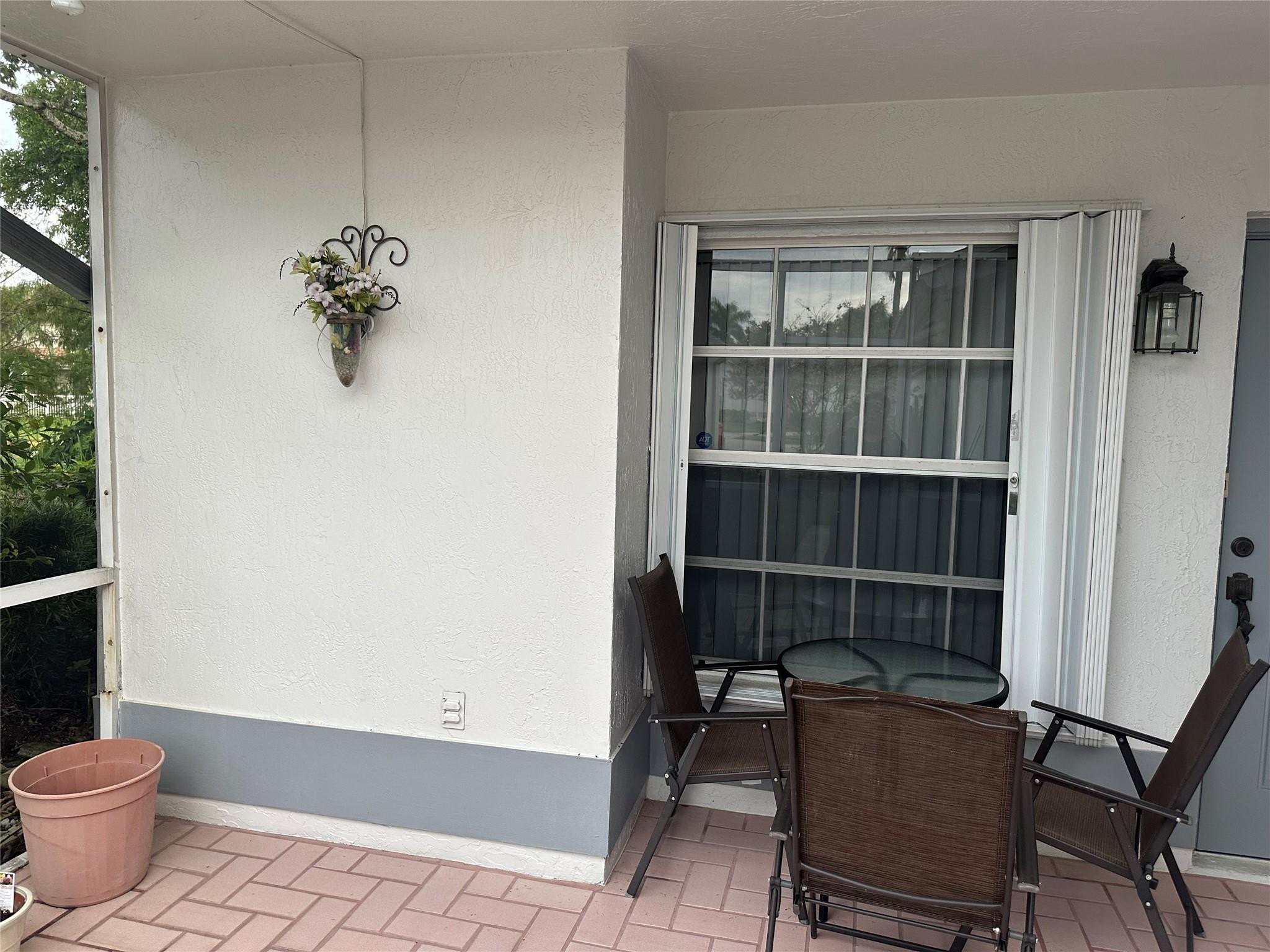 5912 Northwest 93rd Terrace Tamarac, FL 33321 - Photo 9 of 47 Front patio