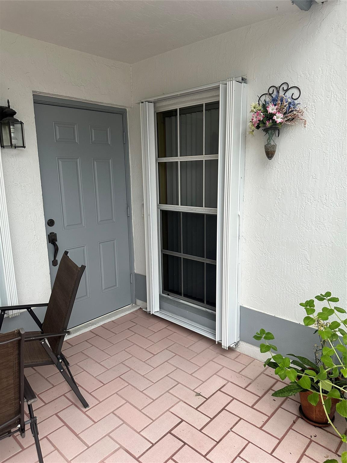 5912 Northwest 93rd Terrace Tamarac, FL 33321 - Photo 10 of 47 Front patio