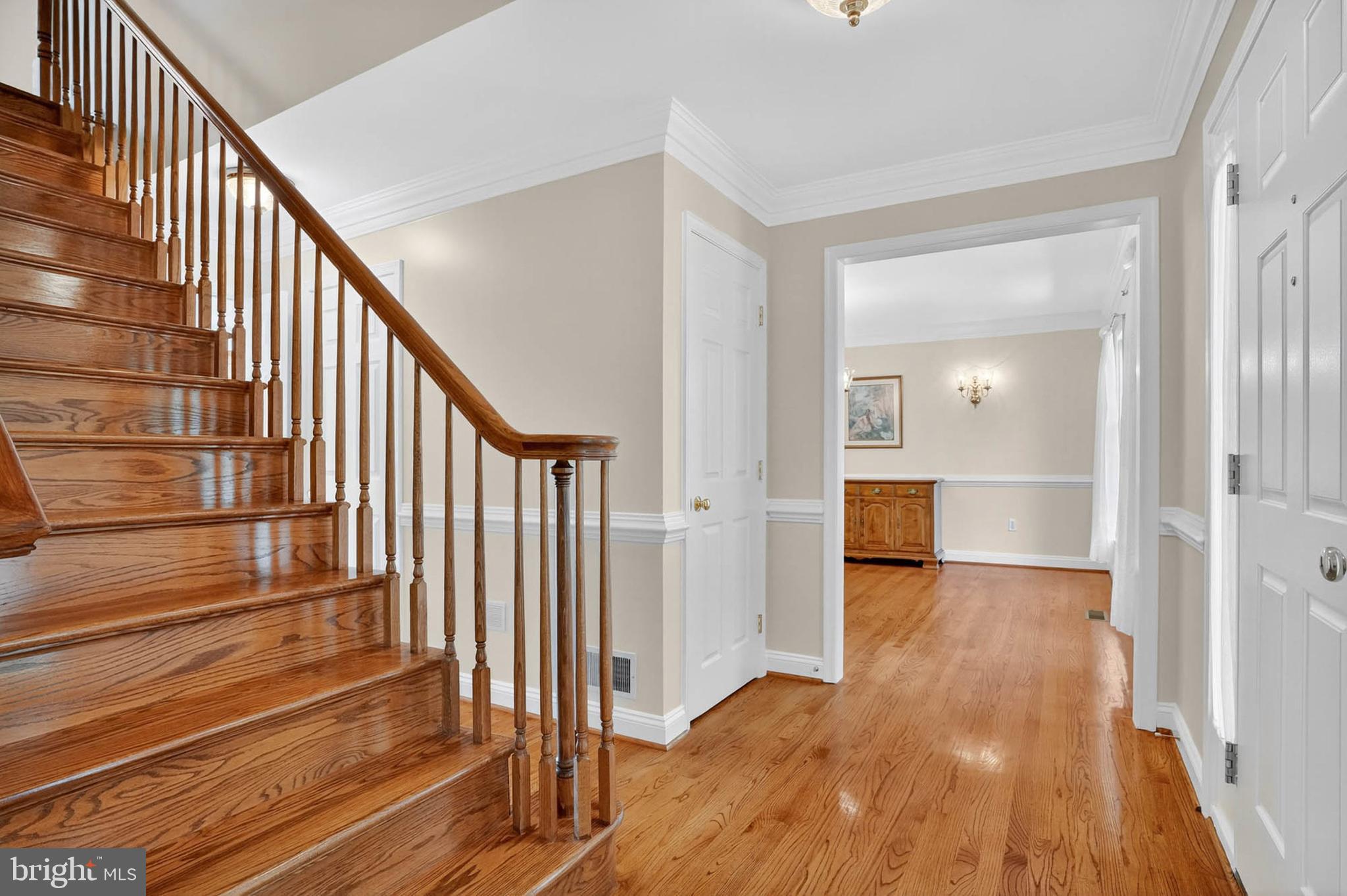 13215 Hunt Ridge Road Ellicott City, MD 21042 - Photo 3 of 53 Foyer w/ gleaming hardwoods throughout main level