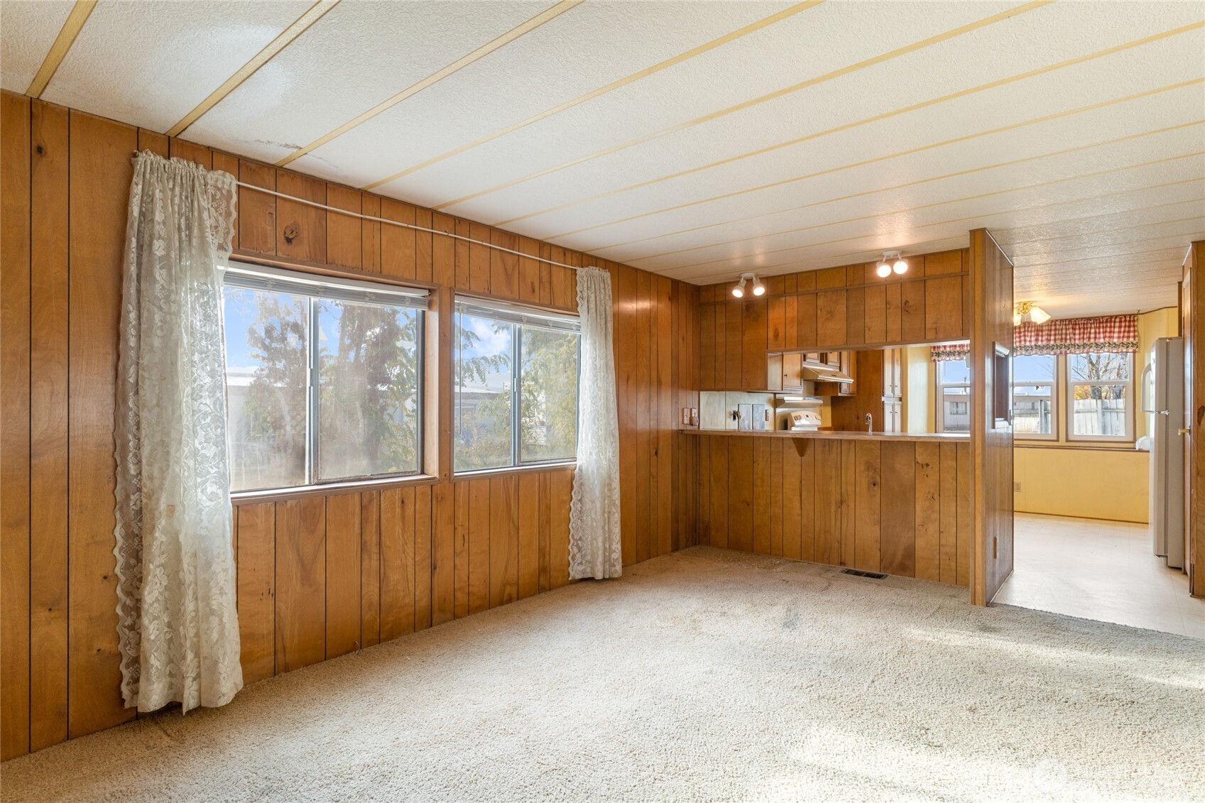 52 Engh Road, Unit 17B Omak, WA 98841 - Photo 6 of 27 a view of an empty room with a window