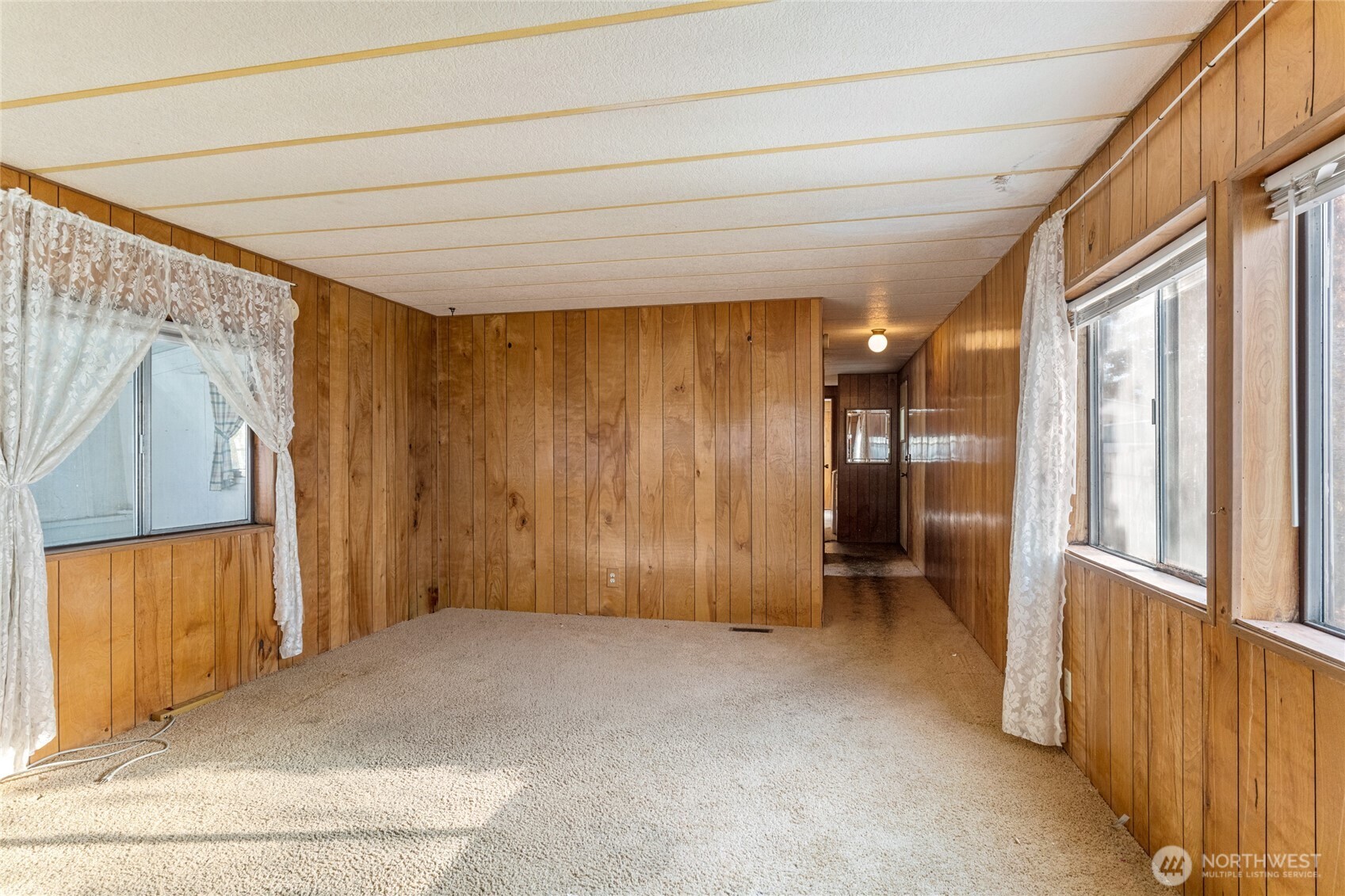 52 Engh Road, Unit 17B Omak, WA 98841 - Photo 7 of 27 a view of entryway with wooden walls
