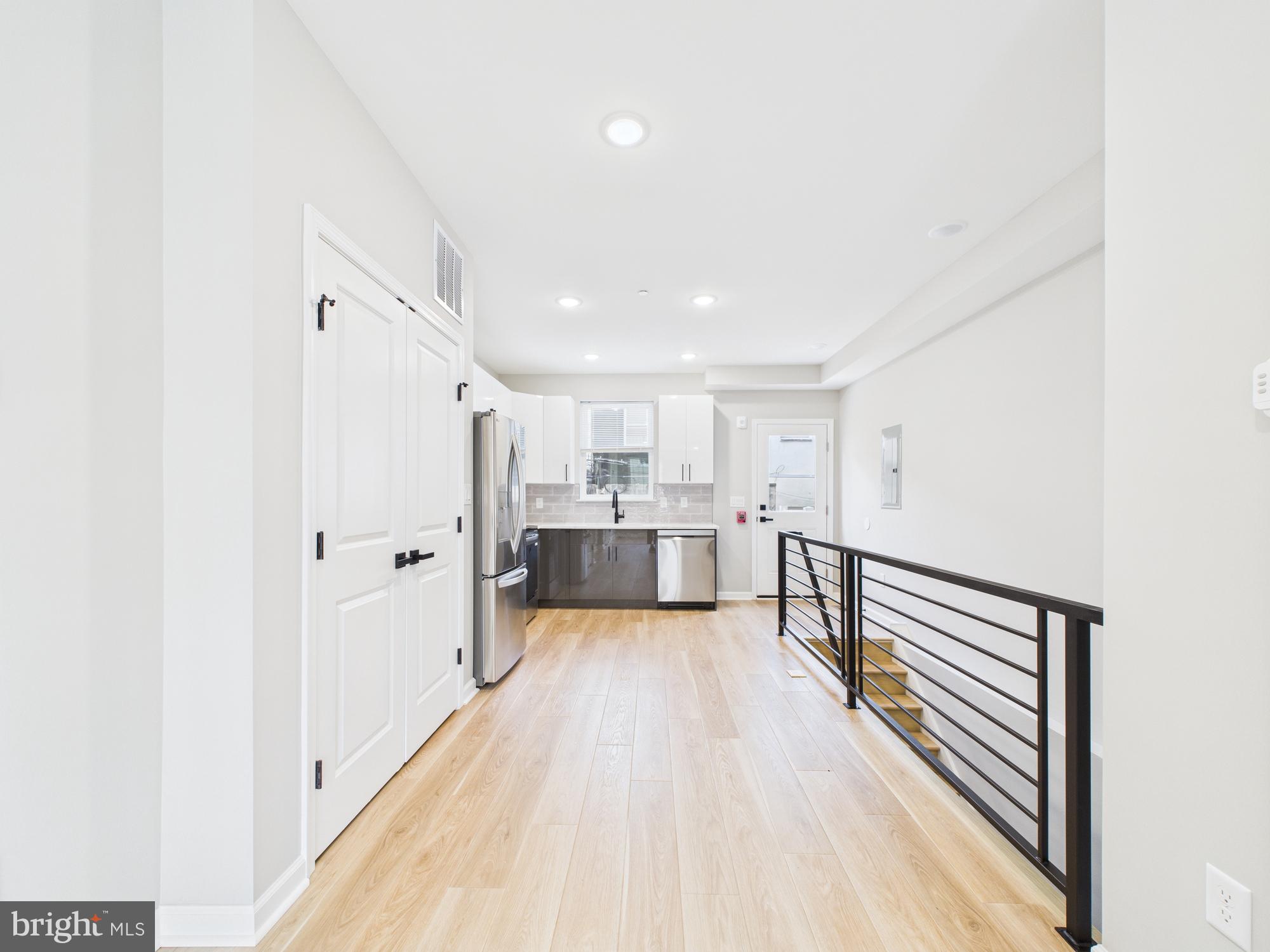 1320 Grove Street, Unit 1 Philadelphia, PA 19146 - Photo 10 of 15 a view of a kitchen with wooden floor