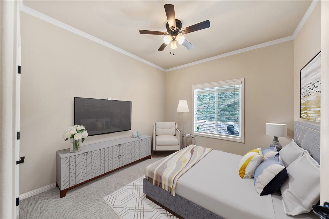 46430 De Portola Road Temecula, CA 92592 - Photo 17 of 61 a bedroom with a bed and a flat screen tv