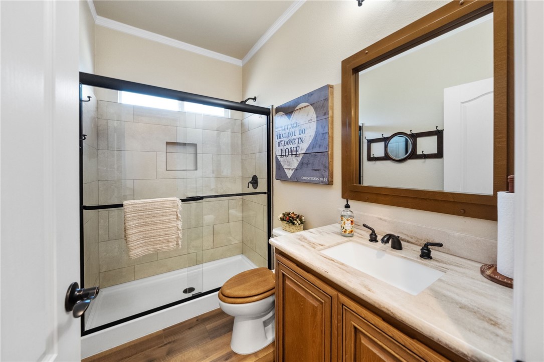 46430 De Portola Road Temecula, CA 92592 - Photo 18 of 61 a bathroom with a sink and a mirror