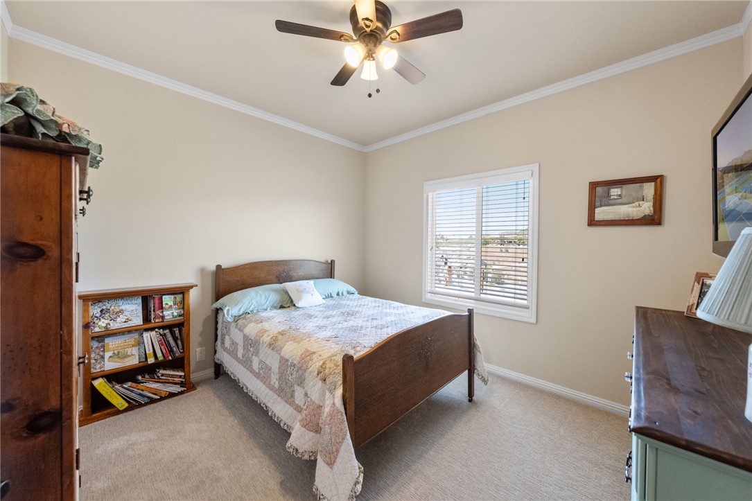 46430 De Portola Road Temecula, CA 92592 - Photo 19 of 61 a bedroom with a bed and a window