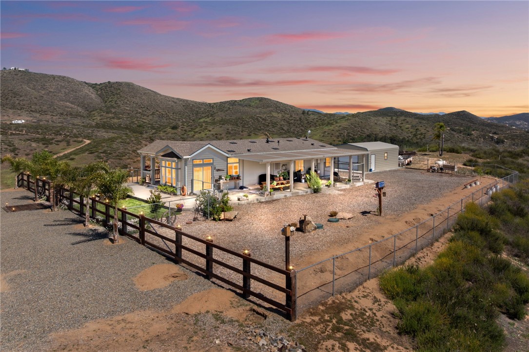46430 De Portola Road Temecula, CA 92592 - Photo 2 of 61 a view of a house with a big yard