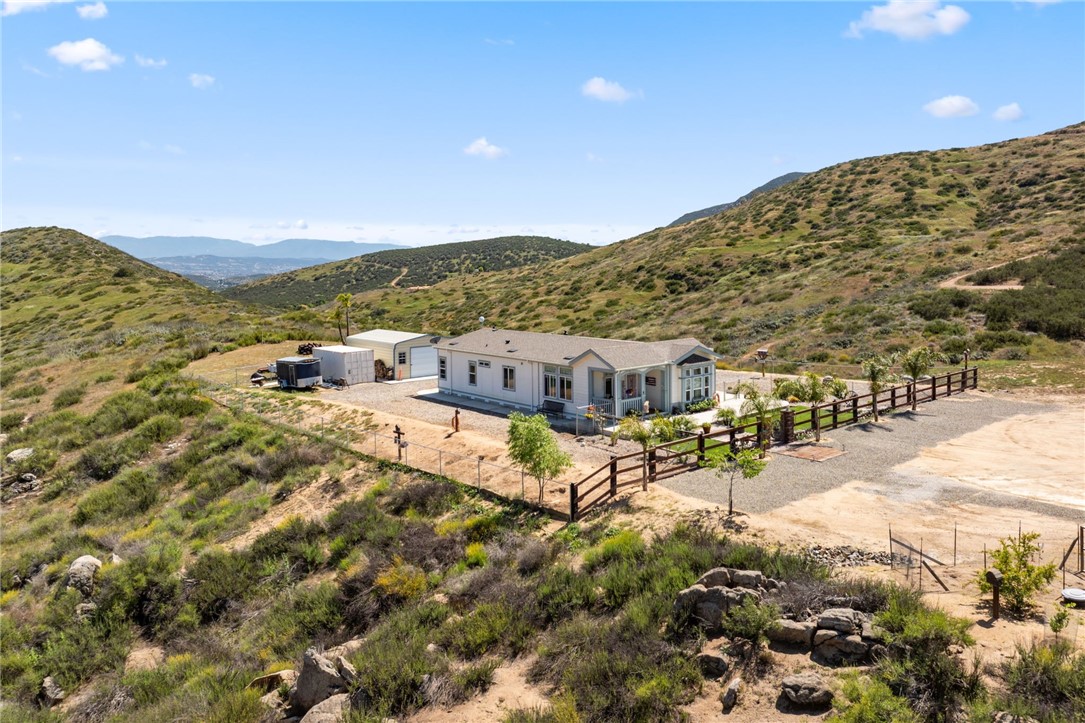 46430 De Portola Road Temecula, CA 92592 - Photo 46 of 61 a view of a large building with a mountain in the background